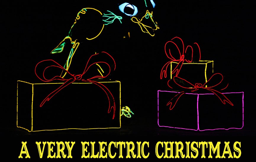 Neon outlines of Christmas gifts against a black background
